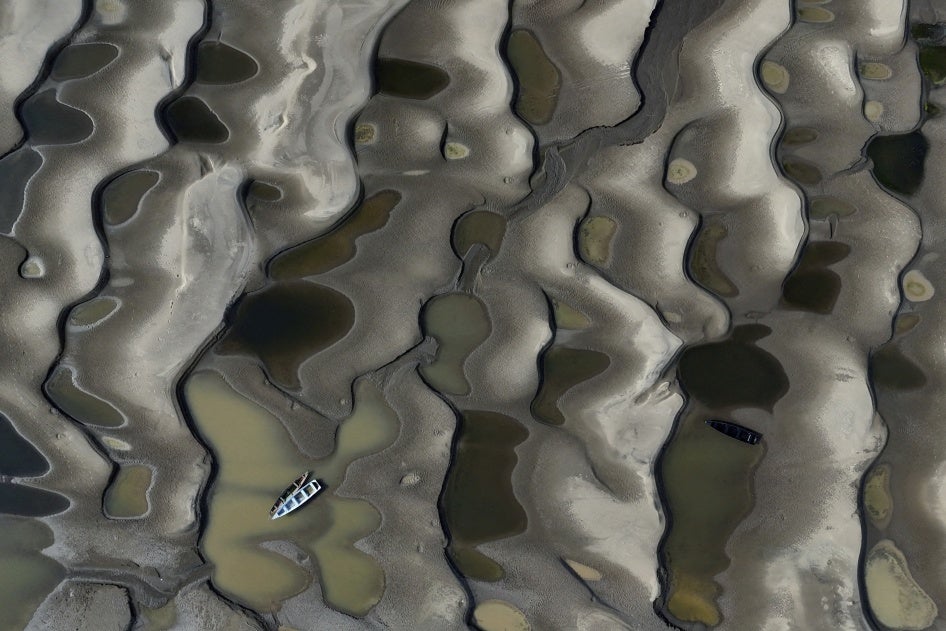 Boats stranded over exposed sandbanksdue to drought at the Solimoes River, one of the largest tributaries of the Amazon River, during the most intense and widespread drought Brazil has experienced since records began in 1950