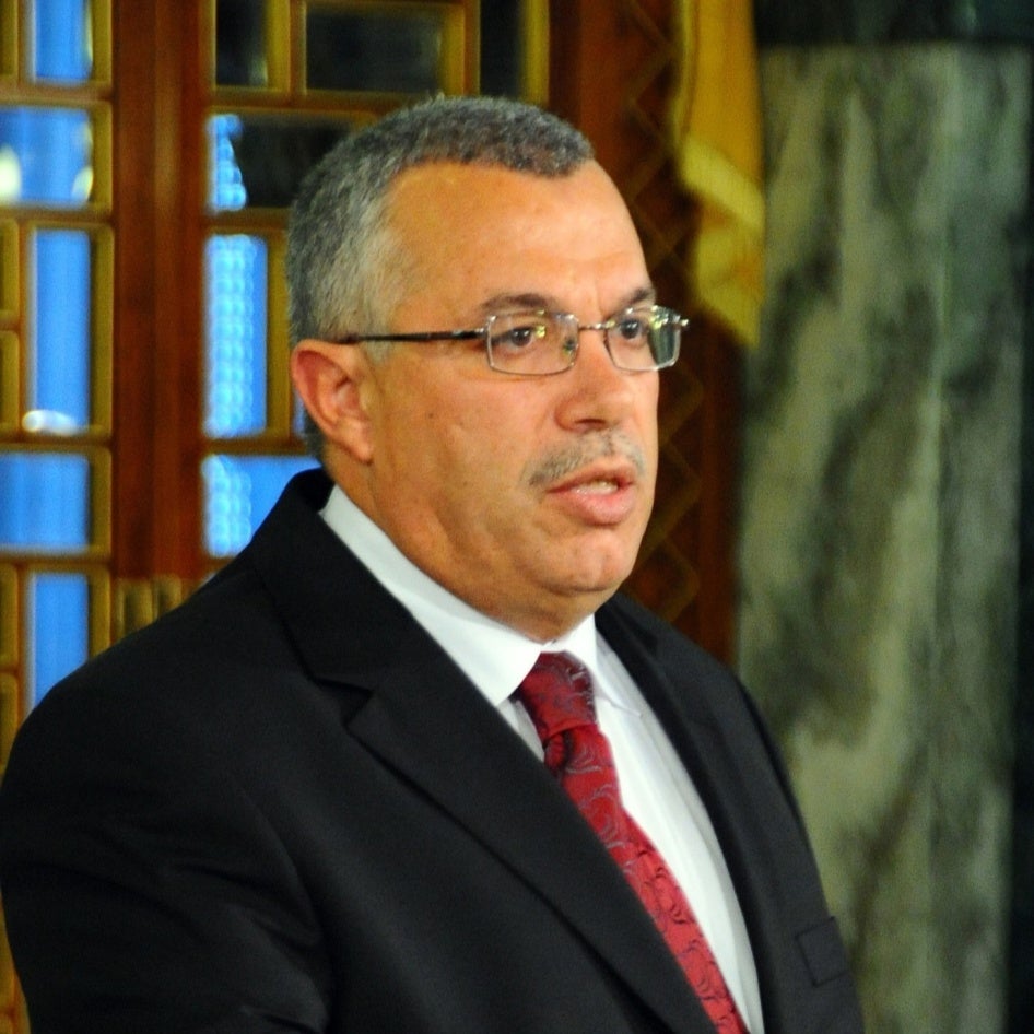 Photo of a man in a suit