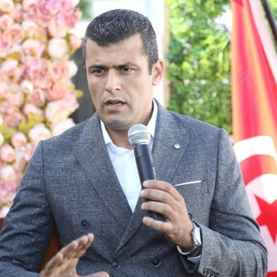 Man speaking into a microphone