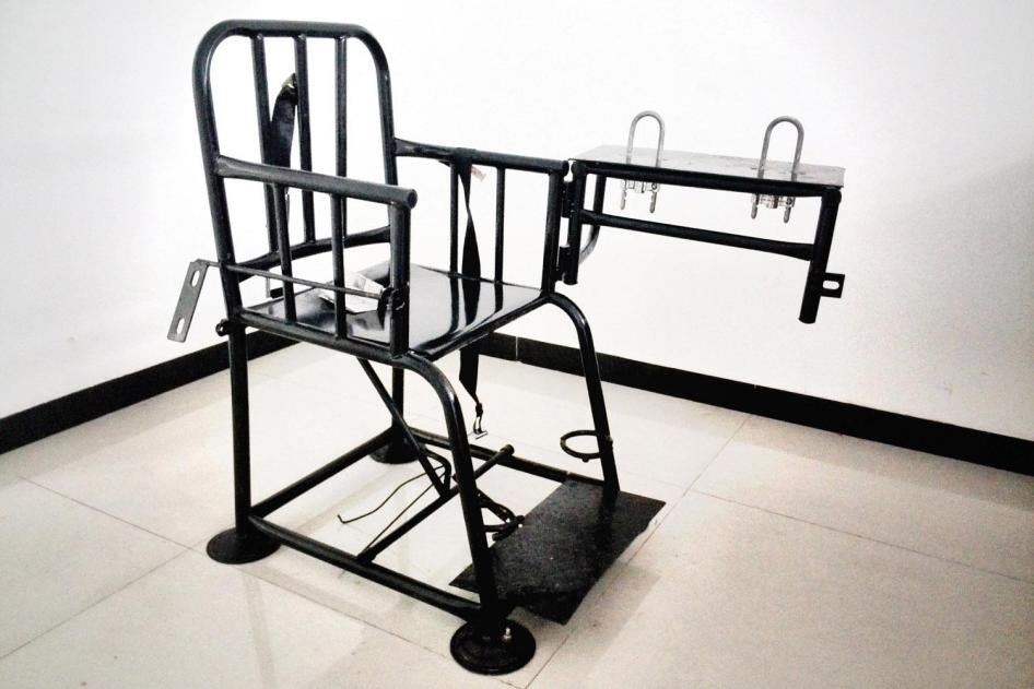 A “tiger chair” specially designed to restrain detainees. Former detainees say that police often strap them into these metal chairs for hours and even days, depriving detainees of sleep, and immobilizing them until their legs and buttocks were swollen.