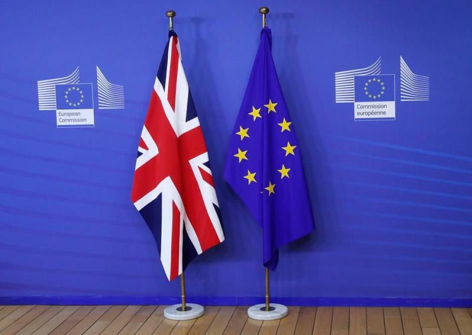 Flags are seen at the EU Commission headquarters ahead of a first full round of talks on Brexit, Britain's divorce terms from the European Union, in Brussels, Belgium July 17, 2017. 