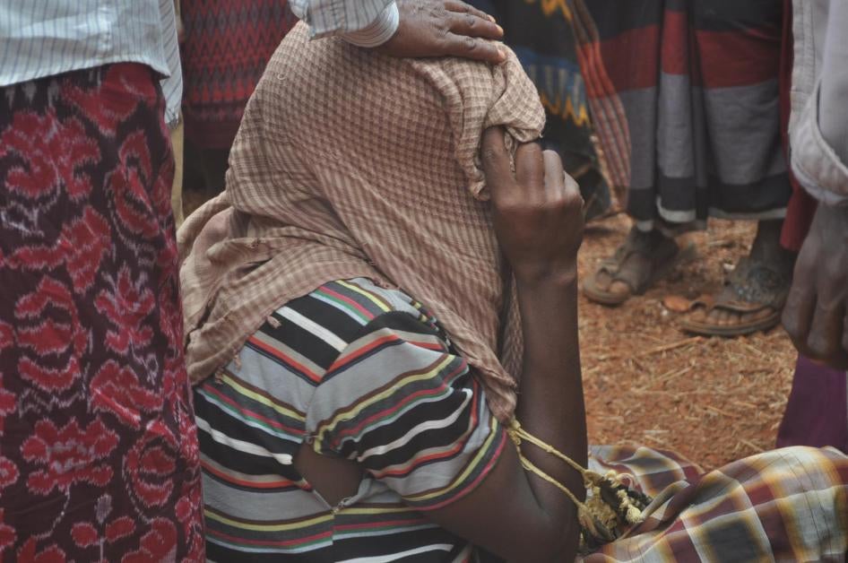 A relative mourning the deaths of 14 civilians, including religious leaders, elders, and koranic school teachers, killed in a small village in the Bay region of southwest Somalia. © 2016 Private