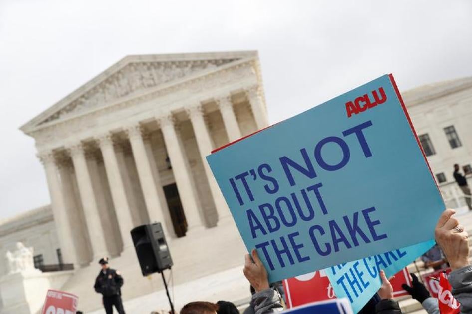 Demonstrators protest during oral arguments in the Masterpiece Cakeshop vs. Colorodo Civil Rights Commission case at the Supreme Court in Washington, U.S., December 5, 2017. 