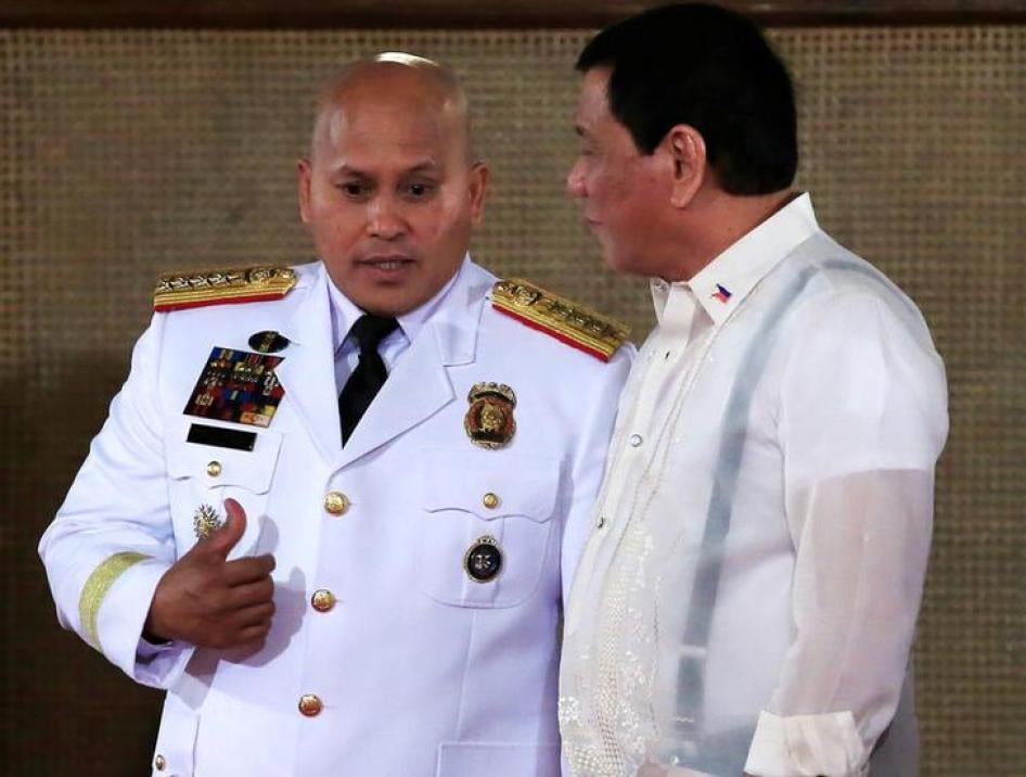 Ronald Dela Rosa talks to President Rodrigo Duterte at the Malacanang presidential palace in metro Manila, Philippines, January 19, 2017.