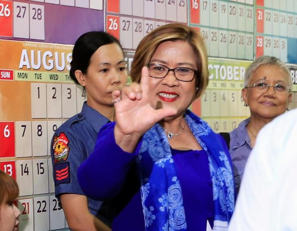 Philippine Senator Leila de Lima, who is detained on drug charges, gestures a "Laban" (Fight) sign inside a local court where she faces an obstruction of justice complaint in Quezon city, metro Manila, Philippines March 13, 2017.