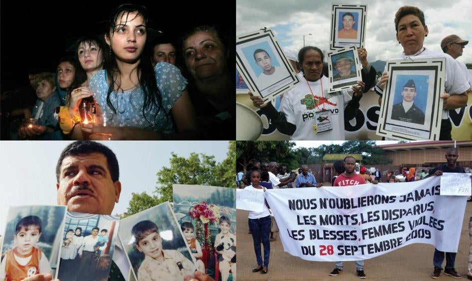 Georgians hold candles during a remembrance ceremony in Gori, west of Georgia’s capital, Tbilisi, a year after the August 2008 war between Georgia and Russia over the breakaway region of South Ossetia. 