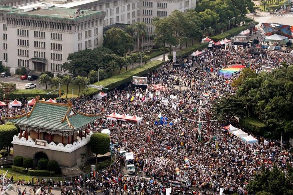 Participants hold rainbow flags at LGBT Pride Parade in Taipei, Taiwan on October 28, 2017. 