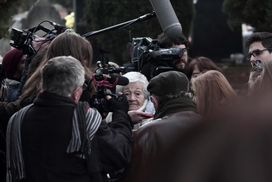 Ascensión Mendieta enters the cemetery where her father’s remains  have are buried in a mass grave. 
