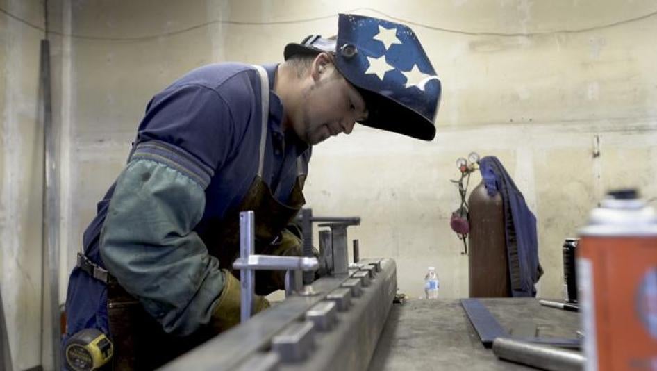 Alan “Superman” González soldando, 5 de junio de 2018