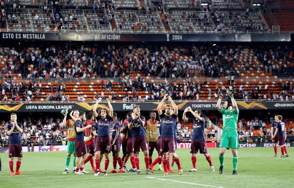 Arsenal players celebrate winning their Europa League football match semifinal against Valencia at the Camp de Mestalla stadium in Valencia, Spain, Thursday, May 9, 2019.
