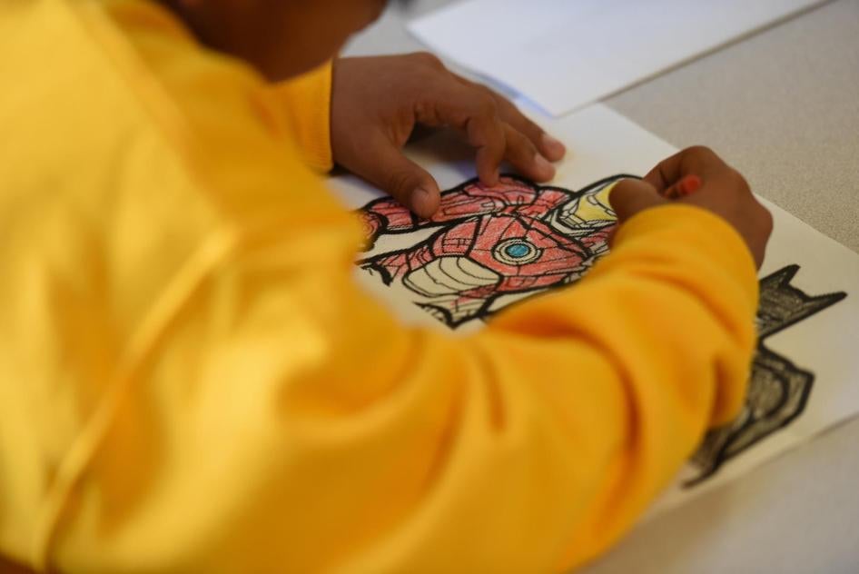 Migrant Child Draws Picture