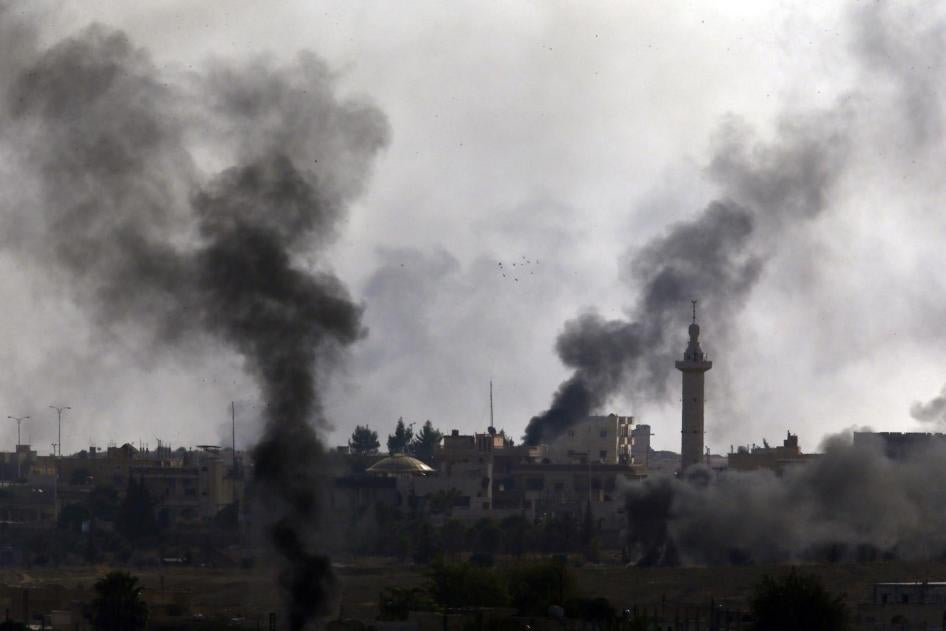 In this photo taken from the Turkish side of the border between Turkey and Syria, in Akcakale, Sanliurfa province, southeastern Turkey, smoke billows from targets inside Syria during bombardment by Turkish forces Thursday, Oct. 10, 2019.
