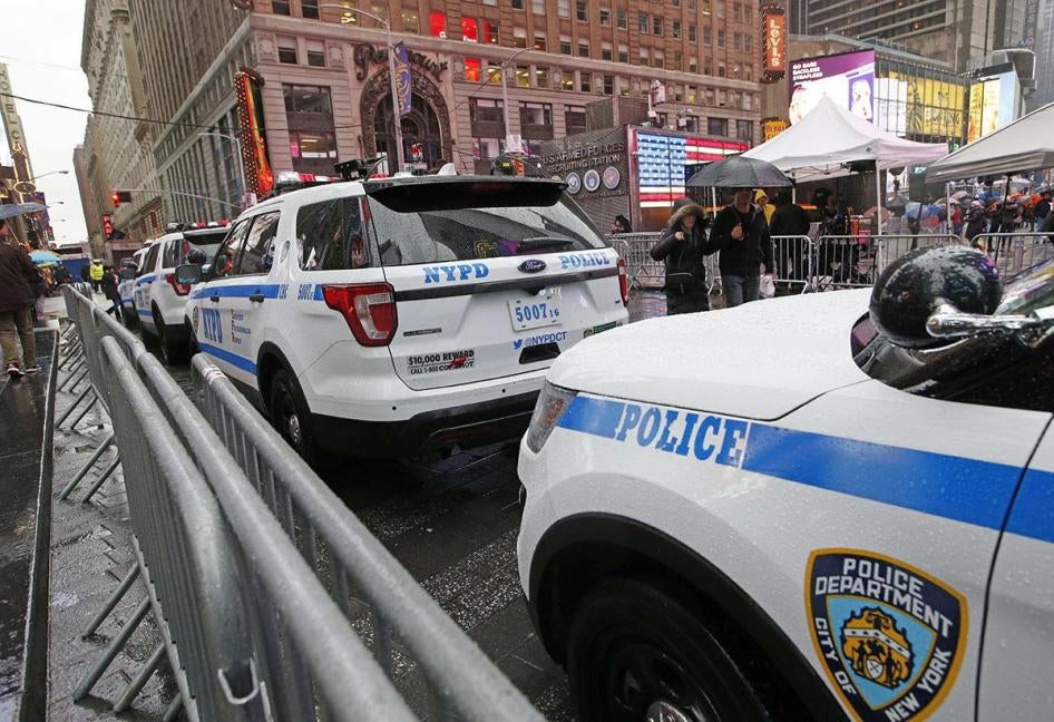 A line of police cars are parked along a street in Times Square, in New York, December 29, 2016.
