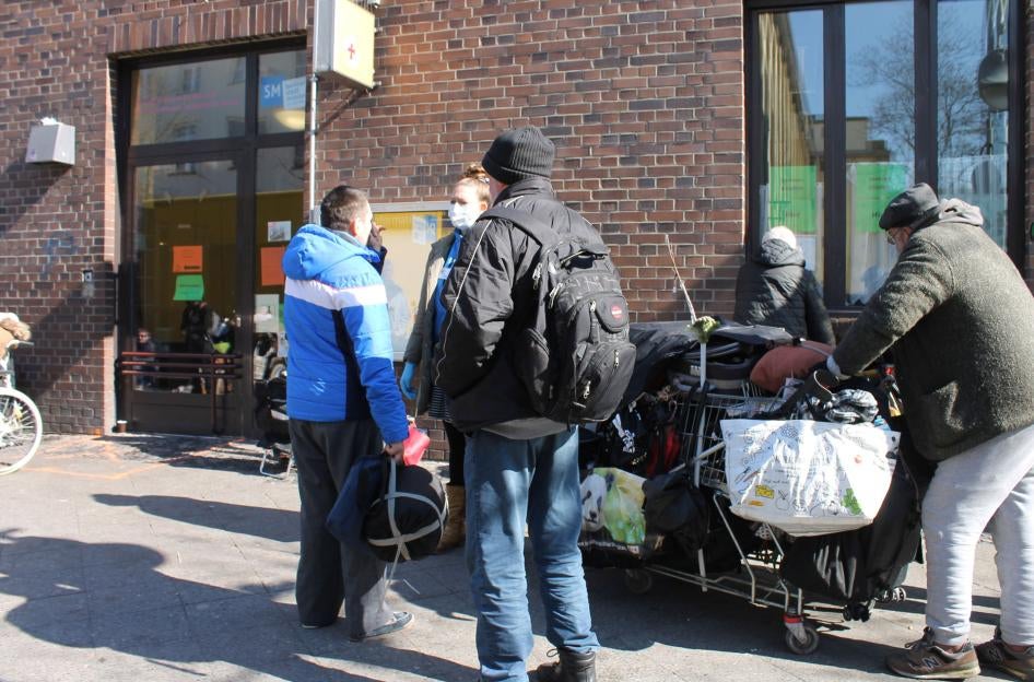 Life on the street: A gathering outside the Bahnhofsmission Zoo, Berlin, Germany. 