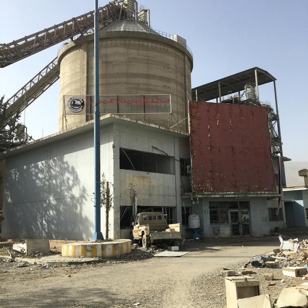 Entrance to the Amran Cement Factory, a government-owned factory that coalition forces struck once in June 2015, and twice in February 2016. © 2016 Priyanka Motaparthy/Human Rights Watch