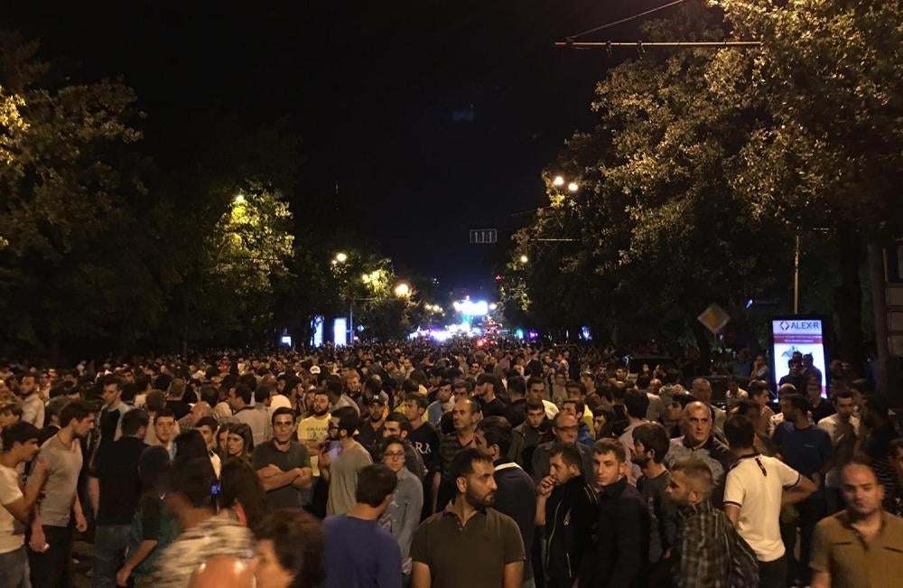 Demonstrators march peacefully in downtown Yerevan on July 30, 2016. 