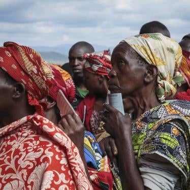 Women queue to cast their votes in the presidential election, in Giheta, Gitega province, Burundi, May 20, 2020.