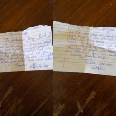 Two handwritten notes dropped at homes in Mamfe town, South-West region, in July, asking residents to contribute 15,000 XAF [USD 26] to the Red Dragons, an armed separatist group, so they can buy weapons and ammunition. ©Private