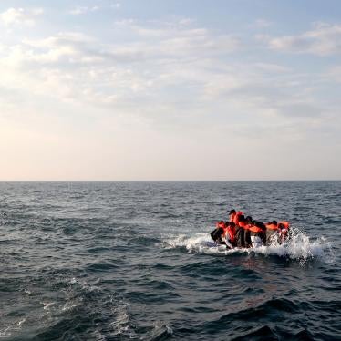 A group of people thought to be migrants crossing the Channel in a small boat headed in the direction of Dover, Kent, United Kingdom, August 10, 2020.
