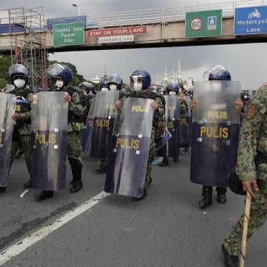 Police officers secure the road leading to the House of Representatives where President Rodrigo Duterte will deliver his 5th State of the Nation Address (SONA) on Monday, July 27, 2020 in Metro Manila, Philippines.