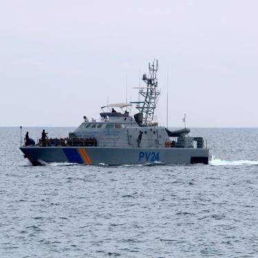 Cyprus coast guard carrying migrants from a boat from Lebanon interdicted on January 14, 2020. © 2020 Reuters/Yiannis Kourtoglou
