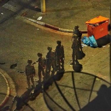 Myanmar soldiers blocking the street in Yangon near the home of Khin Maung Latt on the night of his arrest, March 6, 2021. (c) 2021 Private