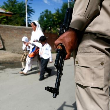 An Indian paramilitary soldier stands guard during a search operation in Srinagar, Kashmir, in August 2018.