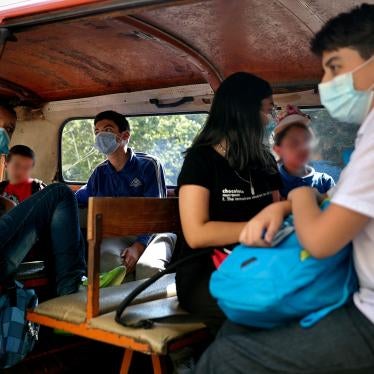 Students sit inside a school bus at the end of their school day in Beirut, Lebanon, 