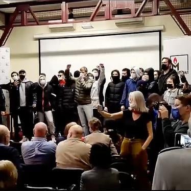 Intruders disrupting film screening at Memorial and yelling “get out of here” and “fascists. Moscow, October 14, 2021.