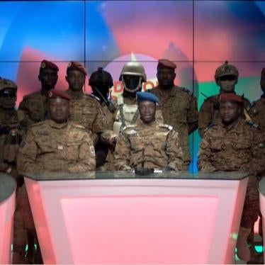 A screen grab shows Capt. Kader Ouedraogo confirming the military coup on state television in Ouagadougou, Burkina Faso on January 24, 2022. 