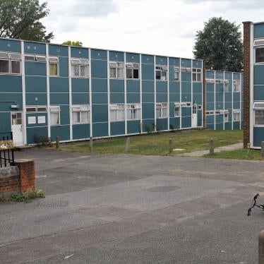Courtyard of a blue and brick housing block