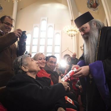 202202americas_canada_priest