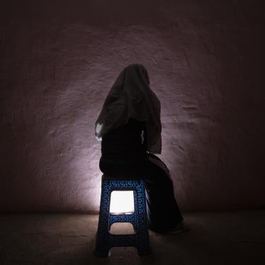 A Tigrayan refugee survivor of rape who fled the conflict in Ethiopia's Tigray sits for a portrait in eastern Sudan near the Sudan-Ethiopia border, on March 20, 2021.
