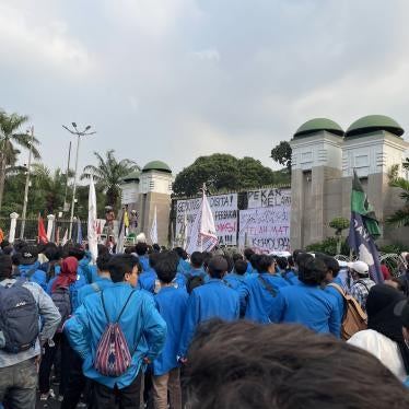 About 2,000 students from several universities in Jakarta protest outside the parliament building, calling on the Indonesian government and parliament to allow sufficient time for public debate on the draft Criminal Code, June 28, 2022.