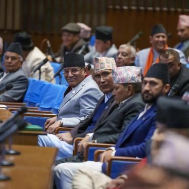 Nepali Prime Minister Pushpa Kamal Dahal, center, sits among other party leaders in parliament in Kathmandu, Nepal.
