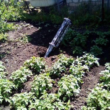 The carrier section of an 9M27K-series Uragan rocket that landed outside the home of a woman living on left bank of the Siverskiy Donets River while Russian forces occupied the area in 2022.  Each rocket delivers 30 9N210 or 9N235 submunitions. 