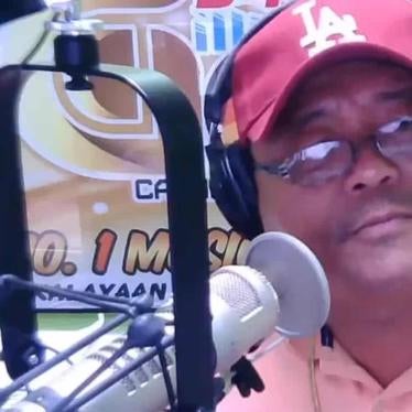 Juan Jumalon during his radio show, Calamba, Misamis Occidental, Philippines.