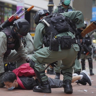 Hong Kong riot police detain a protester during a demonstration against Beijing's national security legislation, Causeway Bay, Hong Kong, May 24, 2020. 