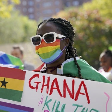 A demonstrator attends a rally against a controversial bill being proposed in Ghana's parliament that would make identifying as LGBTQIA or an ally a criminal offense punishable by up to 10 years in prison, Harlem, New York, October 11, 2021. 