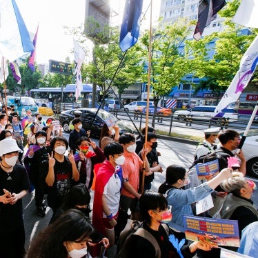 Members of the LGBTQ+ community march towards the new presidential office during a protest ahead of the International Day Against Homophobia, Transphobia and Biphobia, in Seoul, South Korea, May 14, 2022.