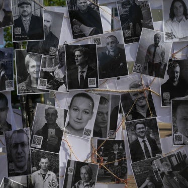 A collage of photos portrays some of the hundreds of political prisoners currently detained in Belarus, displayed during a demonstration in Warsaw, Poland, May 18, 2024.