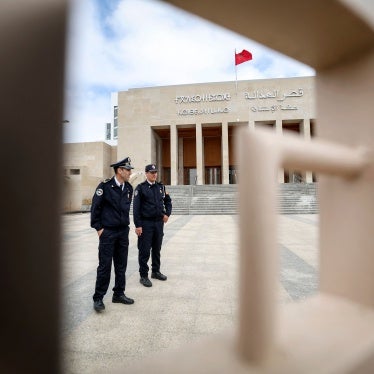 Moroccan policemen stand guard outside the tribunal of Rabat on April 13, 2023.
