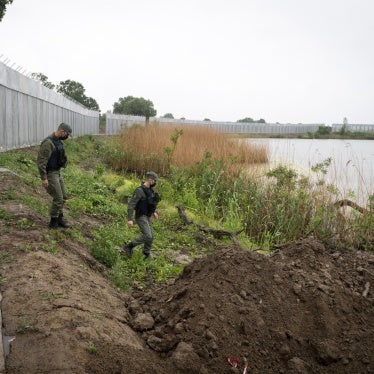  Police patrol along a steel wall at Evros river, near the village of Poros, at the Greek - Turkish border, Greece, May 21, 2021.
