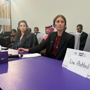 A sign stands in front an empty seat for Saudi human rights activist Lina al-Hathloul, during the Internet Governance Forum in Riyadh, on December 18, 2024. 