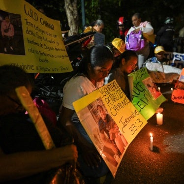 Relatives of Venezuelan migrants deported from the US to a maximum security prison in El Salvador attend a vigil in front of the El Salvadoran embassy in Caracas on April 2, 2025. 