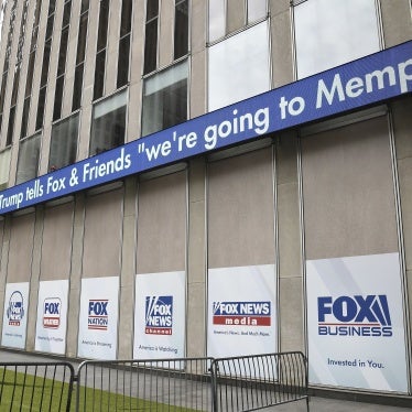 A news ticker announcing a plan to deploy the National Guard