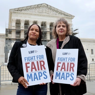 (L-R) Kesha Moore and Anne Houghtaling call on the US Supreme Court to uphold a fair and representative congressional map in Louisiana v. Callais on March 24, 2025 in Washington, DC. 
