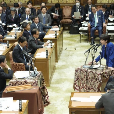 Japanese Prime Minister Sanae Takaichi (R) answers questions from the House of Representatives budget committee in Tokyo, November 7, 2025. 