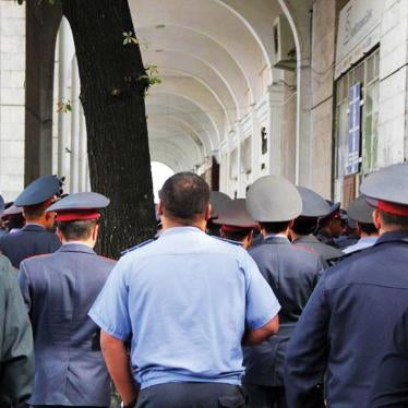 Kyrgyzstan police standing near Ala-Too square.