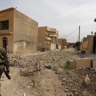 rubble-strewn street in Tikrit